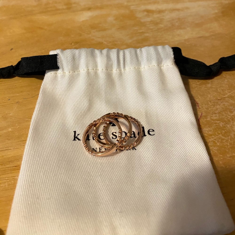 Kate Spade Rose Gold tone rings, size 7